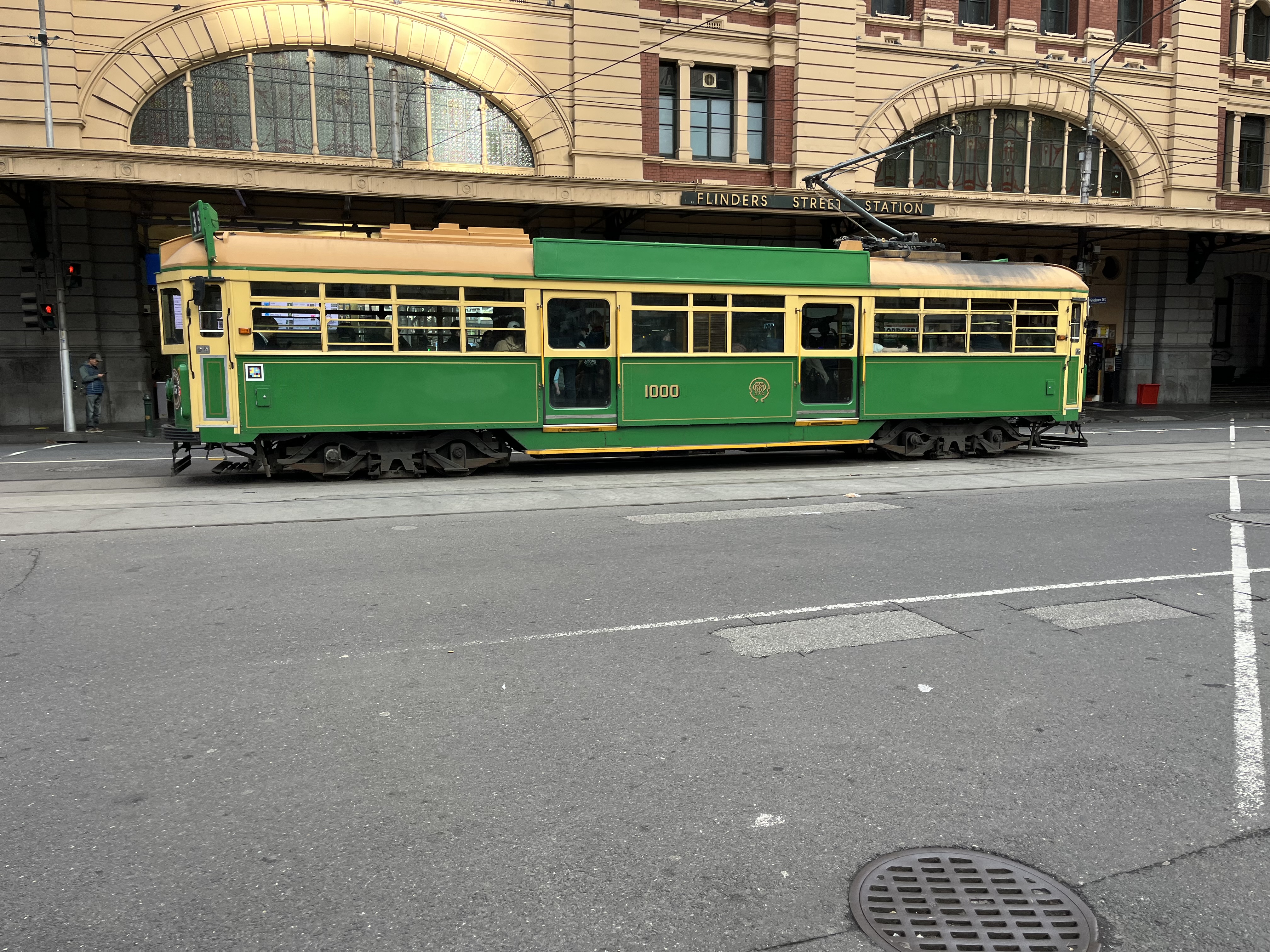 A tram in Melbourne outside Flinders Street railway station