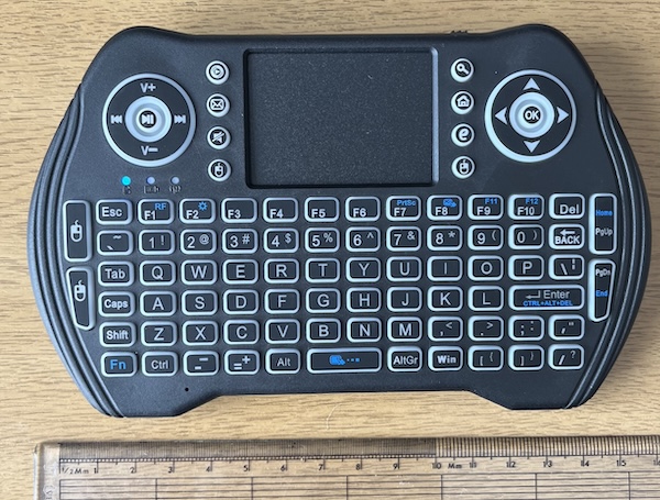 A small RF keyboard and trackpad in black, only 16cm wide.