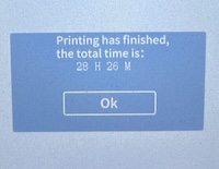 A screenshot of the status display of the 3D printer showing a completion time of 28 hours and 26 minutes