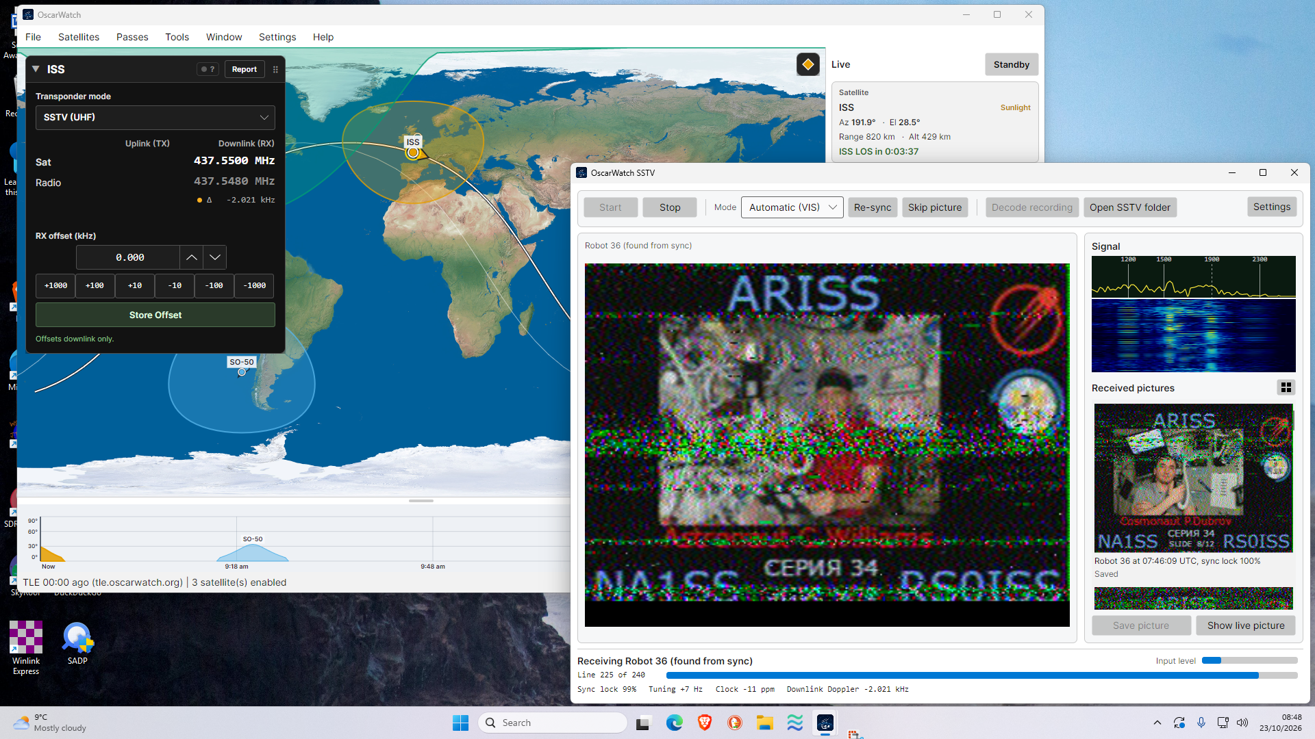 A screenshot of the OscarWatch software showing an image capture with ARISS and NA1SS RS0ISS plus the track of ISS on a map